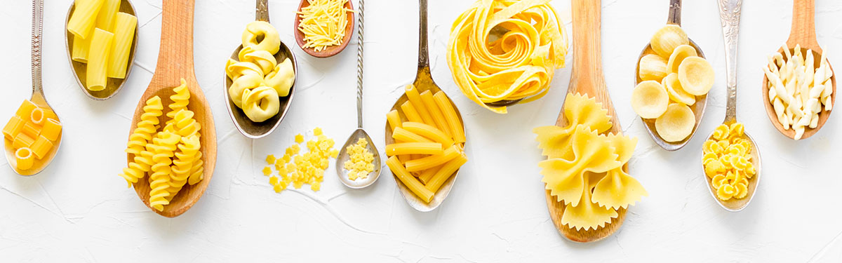 Variety,Of,Types,And,Shapes,Of,Italian,Pasta,In,Wooden